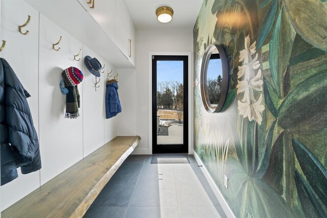 W4038 Maplewood Ln, Fond Du Lac, WI 54937 - mudroom featuring baseboards and tile patterned flooring