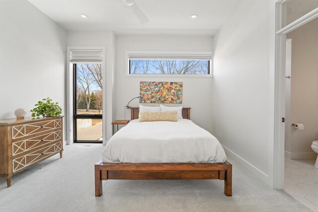 W4038 Maplewood Ln, Fond Du Lac, WI 54937 - bedroom featuring multiple windows, baseboards, and carpet floors