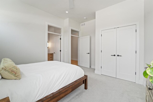 W4038 Maplewood Ln, Fond Du Lac, WI 54937 - bedroom featuring ceiling fan, visible vents, a closet, and light carpet
