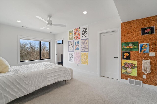 W4038 Maplewood Ln, Fond Du Lac, WI 54937 - carpeted bedroom featuring recessed lighting, visible vents, baseboards, and an accent wall