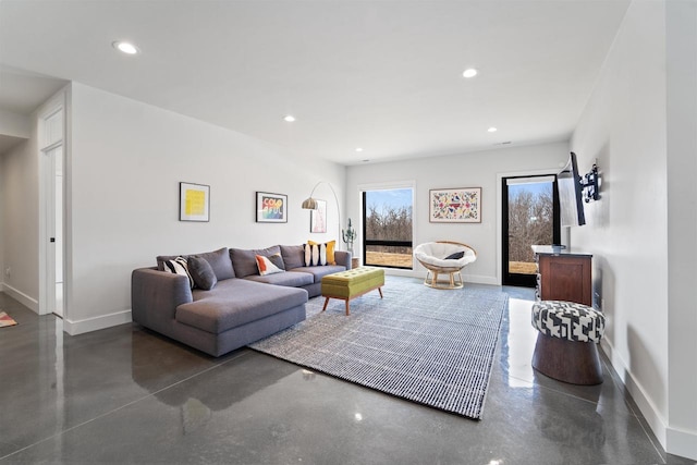 W4038 Maplewood Ln, Fond Du Lac, WI 54937 - living room with recessed lighting, concrete floors, and baseboards