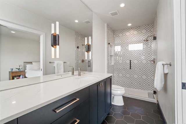 W4038 Maplewood Ln, Fond Du Lac, WI 54937 - full bath featuring visible vents, tiled shower, recessed lighting, tile patterned flooring, and toilet