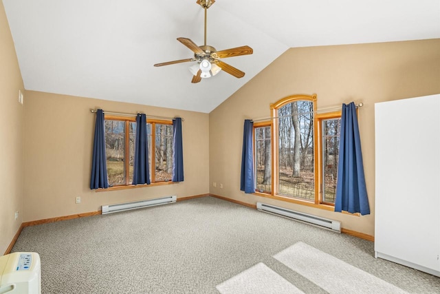 carpeted empty room with vaulted ceiling, a baseboard radiator, and a wealth of natural light