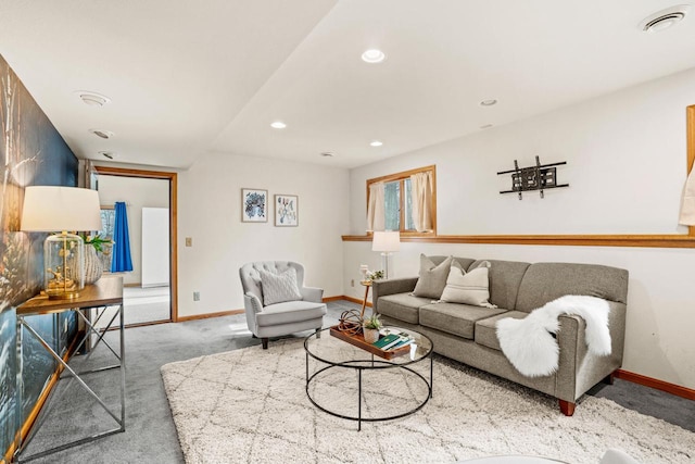 carpeted living room featuring recessed lighting, visible vents, and baseboards