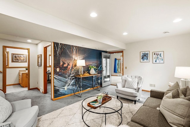 carpeted living room with baseboards and recessed lighting