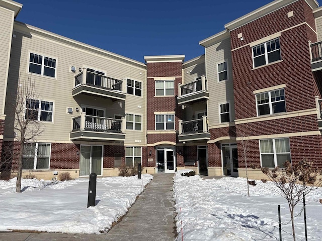 view of snow covered property