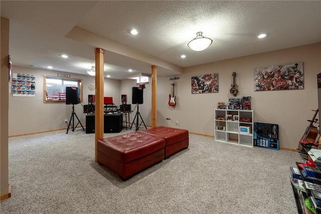 playroom featuring carpet floors, a textured ceiling, and recessed lighting