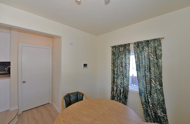 dining room with light wood-style floors