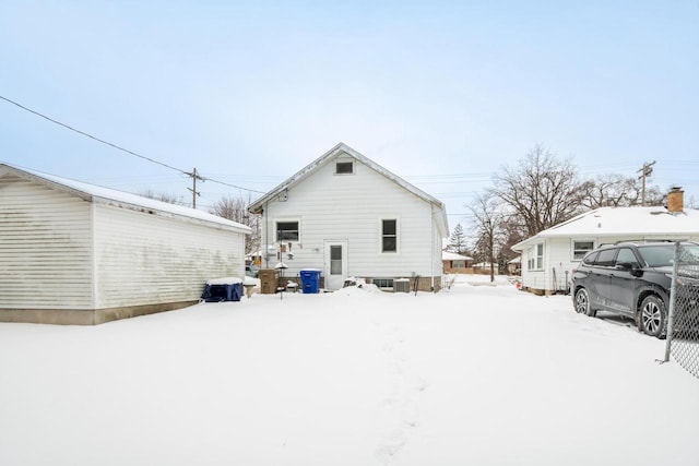 view of snow covered house