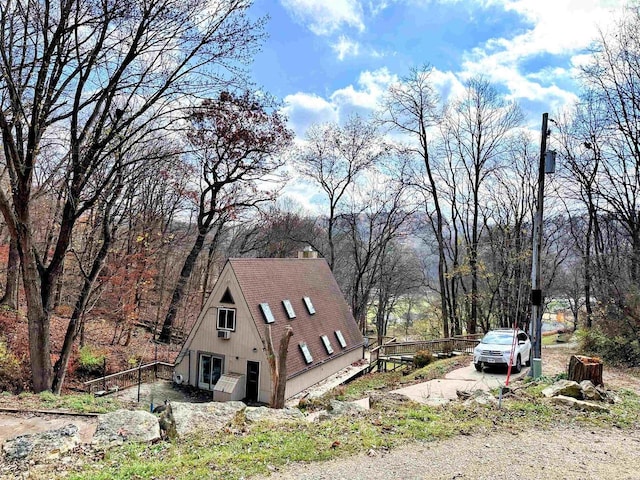 exterior space featuring a chimney