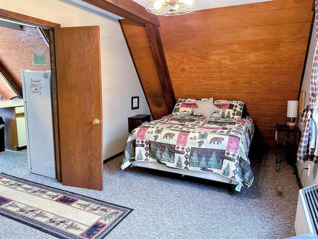 carpeted bedroom with wood walls