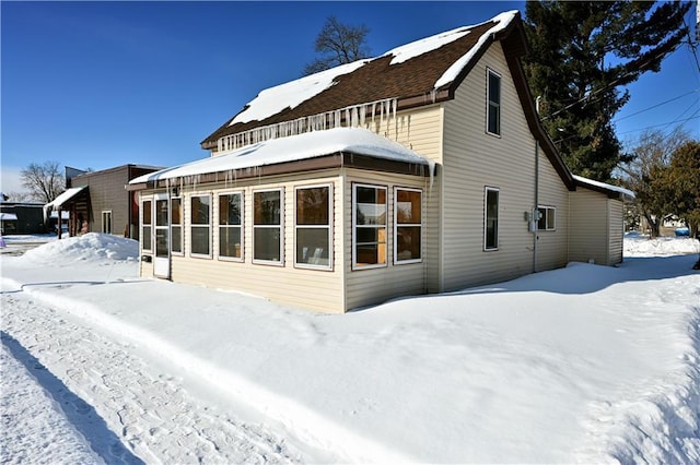 view of snow covered property