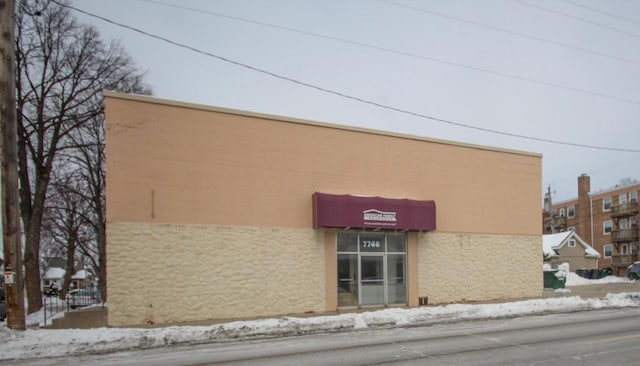 view of snow covered building