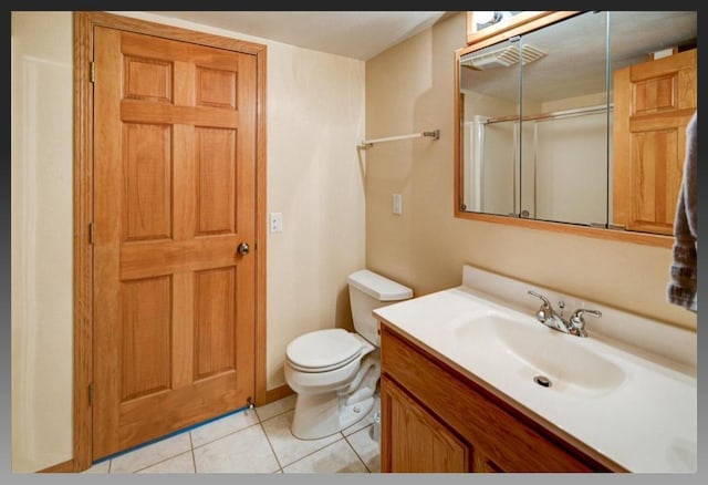 bathroom with visible vents, toilet, a stall shower, tile patterned flooring, and vanity