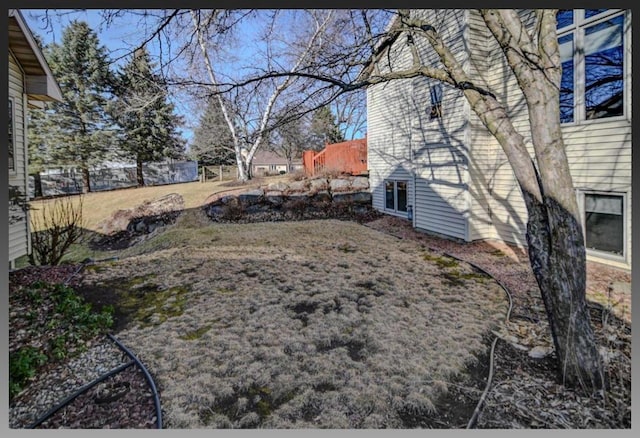 view of yard with fence