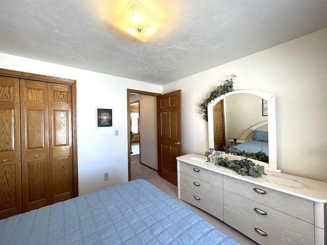 bedroom featuring light colored carpet