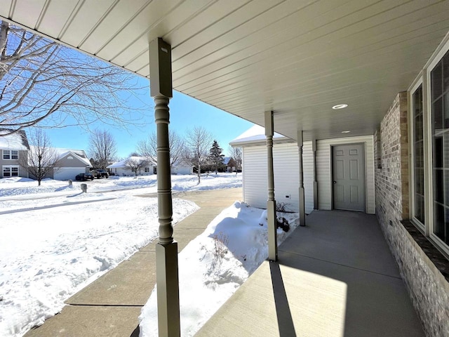 view of snow covered patio