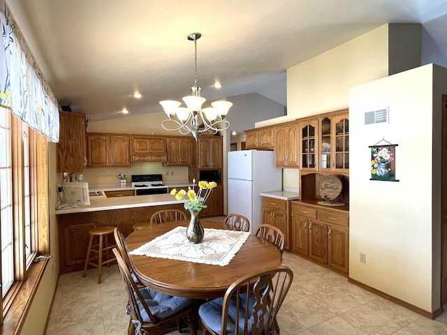 dining space featuring visible vents, vaulted ceiling, baseboards, and an inviting chandelier