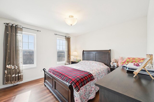 2418 Leopold Way, Sun Prairie, WI 53590 - bedroom featuring wood finished floors and baseboards