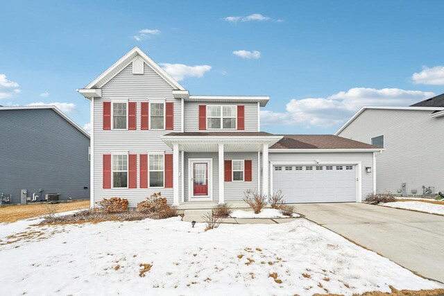 2418 Leopold Way, Sun Prairie, WI 53590 - traditional-style house featuring a garage, driveway, and central AC unit
