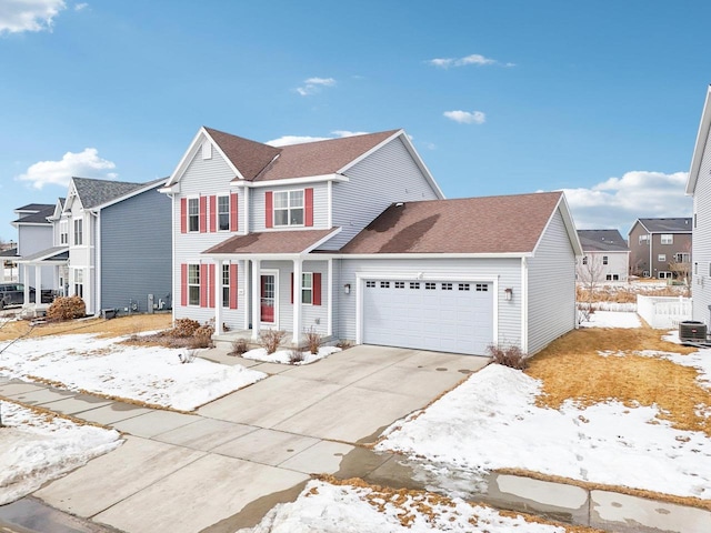 2418 Leopold Way, Sun Prairie, WI 53590 - traditional home with a shingled roof, concrete driveway, a residential view, an attached garage, and central AC