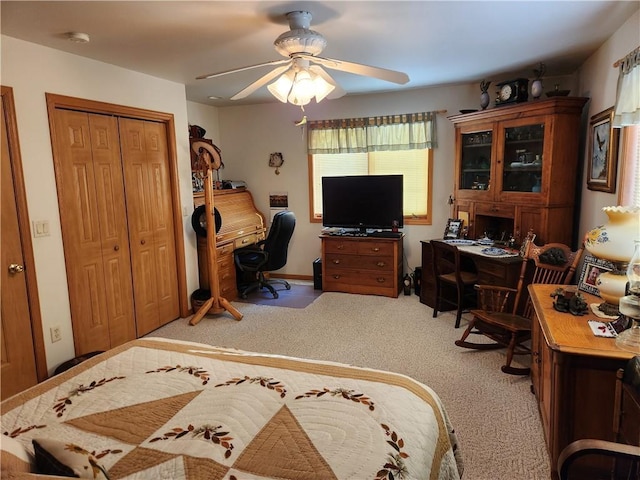 600 S Hayden St, Merrillan, WI 54754 - bedroom featuring carpet floors, a closet, and a ceiling fan