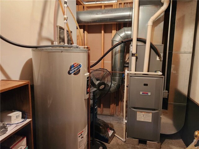 600 S Hayden St, Merrillan, WI 54754 - utility room featuring water heater