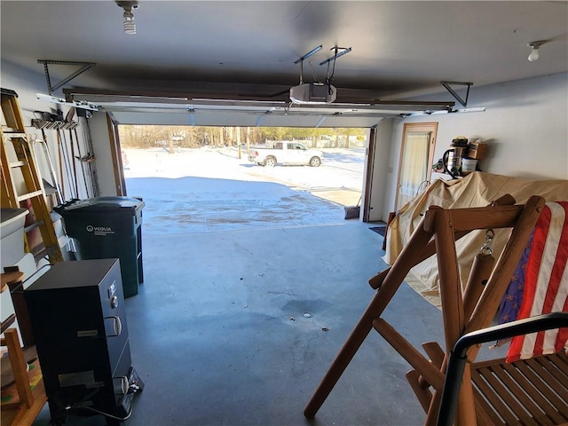 600 S Hayden St, Merrillan, WI 54754 - garage featuring a garage door opener