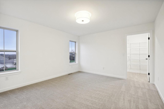 N174W20582 Laurel Springs Cir, Jackson, WI 53037 - empty room with light carpet, visible vents, and baseboards