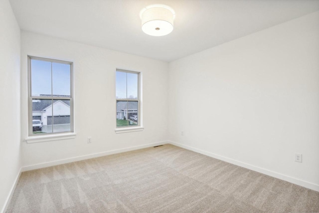 N174W20582 Laurel Springs Cir, Jackson, WI 53037 - empty room featuring light colored carpet and baseboards