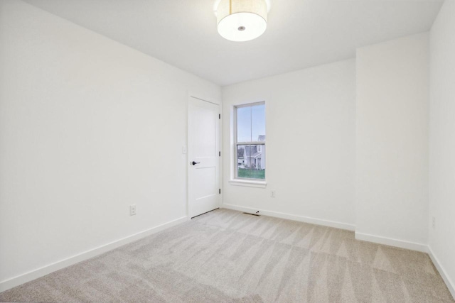 N174W20582 Laurel Springs Cir, Jackson, WI 53037 - unfurnished room featuring light carpet and baseboards
