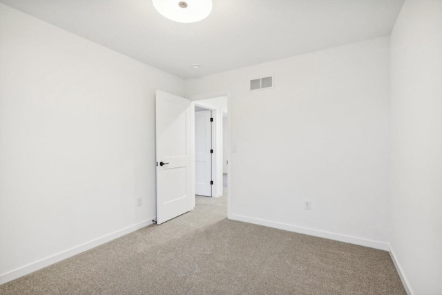 N174W20582 Laurel Springs Cir, Jackson, WI 53037 - empty room with baseboards, visible vents, and light colored carpet