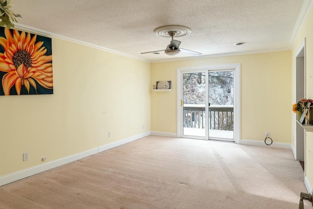 4191 Aspen Ln, La Crescent, MN 55947 - unfurnished room with baseboards, a ceiling fan, light colored carpet, a textured ceiling, and crown molding