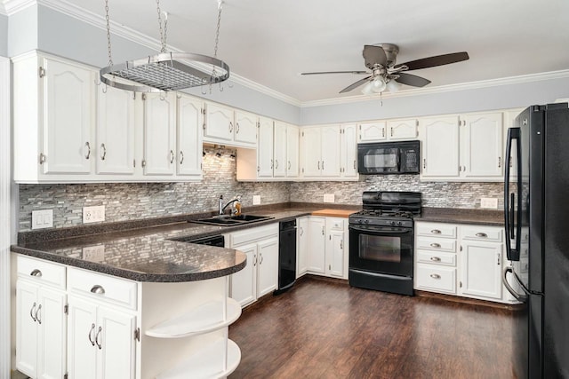 4191 Aspen Ln, La Crescent, MN 55947 - kitchen with black appliances, crown molding, white cabinetry, and a sink