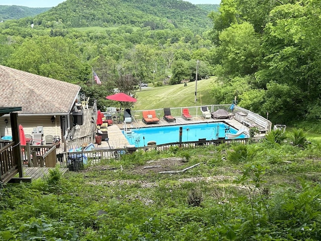 4191 Aspen Ln, La Crescent, MN 55947 - pool featuring a wooded view and a wooden deck