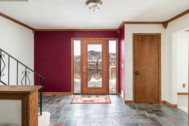 4191 Aspen Ln, La Crescent, MN 55947 - entrance foyer featuring baseboards, ornamental molding, stairs, and stone tile floors