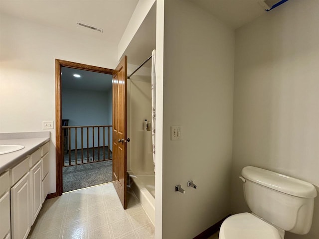 full bathroom with visible vents, toilet, tub / shower combination, vanity, and tile patterned floors