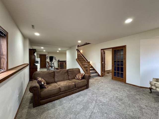 living area with stairs, carpet floors, and recessed lighting