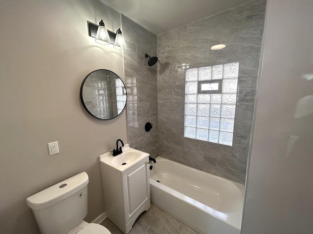 full bath with toilet,  shower combination, and vanity