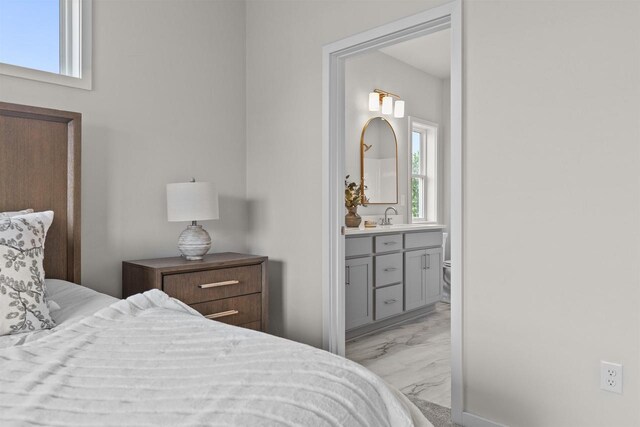 3687 Callalilly Ln, Appleton, WI 54913 - bedroom with light marble finish flooring and ensuite bath