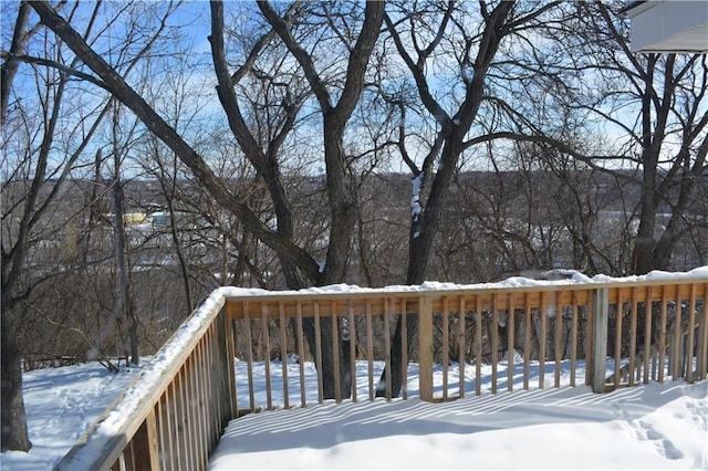 view of snow covered deck