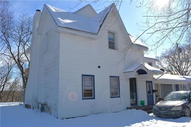 view of snow covered property