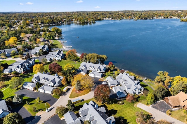 aerial view with a water view and a residential view