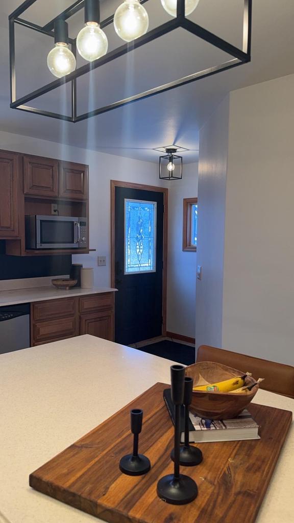 kitchen featuring stainless steel appliances and butcher block counters