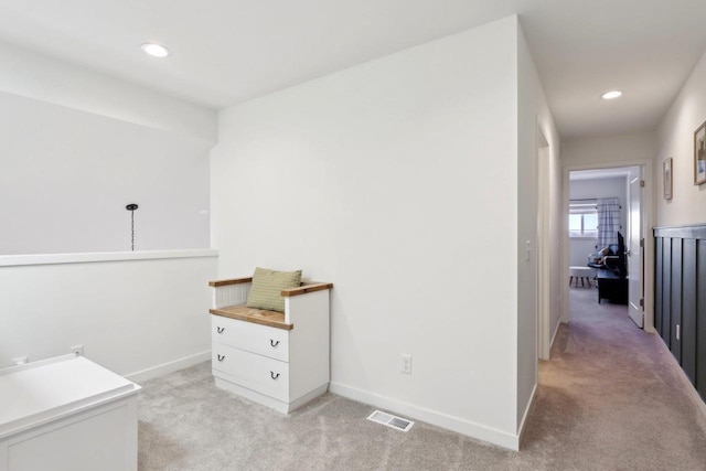 unfurnished office featuring baseboards, recessed lighting, visible vents, and light colored carpet