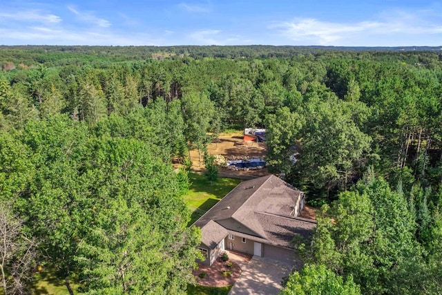 drone / aerial view with a forest view