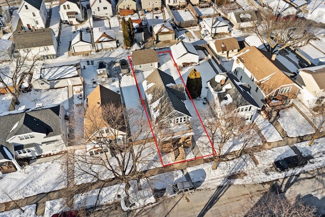 birds eye view of property with a residential view