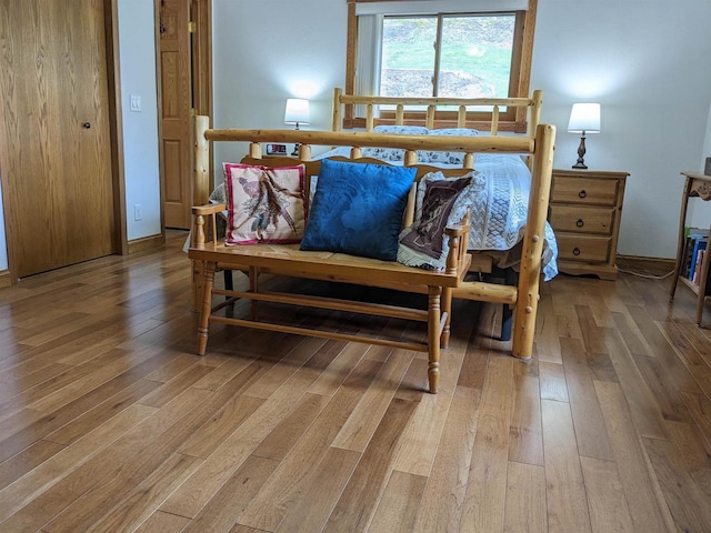 bedroom featuring wood finished floors