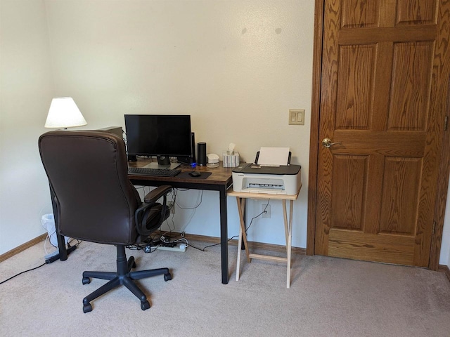 office area with baseboards and light colored carpet