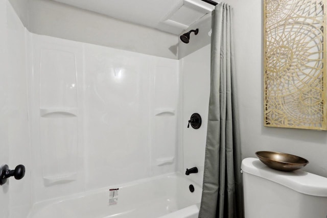 bathroom with shower / bath combination with curtain